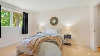 This primary bedroom brings the space and then some - room for a king bed, or cozy reading nook, or even a little yoga corner if that’s your vibe. And just to the right, the walk-in closet is spacious enough to keep everything organized and out of sight.