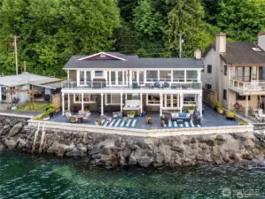Wake up to breathtaking views of Seattle to the north, the Olympic peninsula to west, and stunning sunrises to the east-all from this exceptional waterfront home!