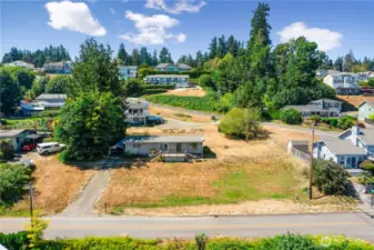 Property includes large tree on left.  2 lots together