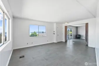 Living Room view to family room including pellet stove
