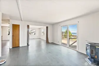 Family Room with sliding door and deck for view and outdoor entertaining