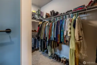 Large walk in closet (closet wraps around to the left with window)