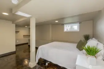 Downstairs bedroom #1, huge space with custom built closet organization.