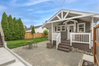 Large covered back porch perfect for year round entertaining in the PNW!