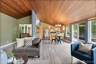 Open to dining area and kitchen