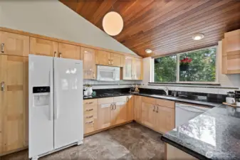 Open kitchen with plenty of counter and cabinet space