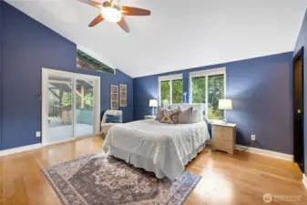 Primary bedroom steps out to private covered hot tub