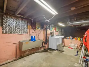 A large unfinished basement offers potential for additional living space