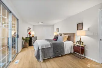 Peaceful primary retreat with private backyard access.