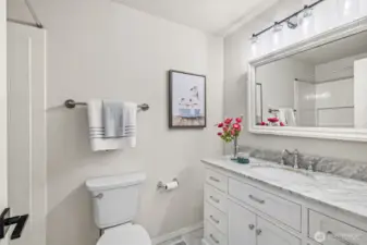 Second full bath with clean finishes and modern updates.