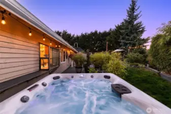 Private hot tub retreat for year-round enjoyment.