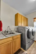 Laundry room with cabinets
