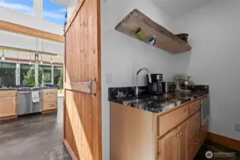 butlers pantry with sliding door