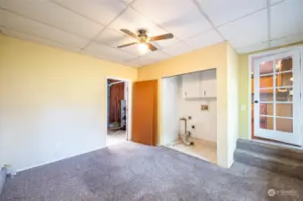 Door on right comes from the kitchen. On the left is the storage area. Remove the wall if you want a full garage again.