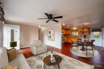 Virtually staged living room w/view of dining and kitchen areas