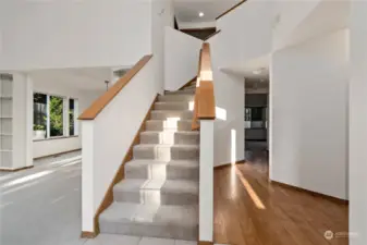 Wide staircase and hallways throughout.