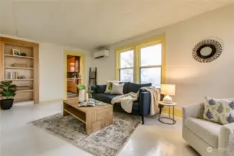 Large living room with built-ins and south-facing windows