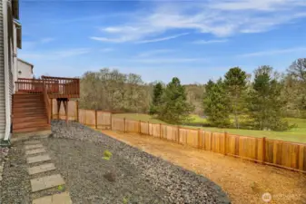 Significant resources and care were dedicated to terracing the large backyard, making it not only visually stunning but also far more accessible and practical for a variety of uses. The fencing is new too!