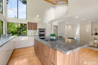 Beautiful kitchen with hardwood floors, huge windows, two-tone cabinets, carefully designed lightening - seller worked with interior designer to design this piece of art!