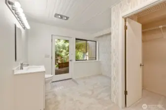 Updated bath downstairs with walk-in closet and separate entrance.