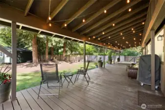 The covered back deck is a true highlight—spacious, private, and perfect for relaxing or entertaining year-round!
