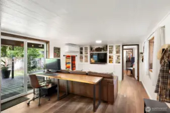 Built in cabinets in the living room & Mini Split A/C and Heating unit for cool summers!
