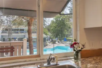 You can look out at the pool from your kitchen sink