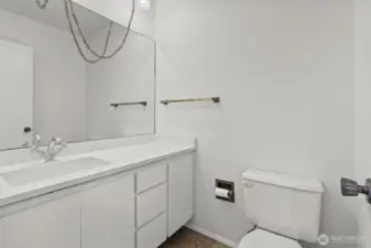 New countertops, sink  and paint in the main floor powder room.