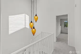 Original mid-century light fixture over staircase.