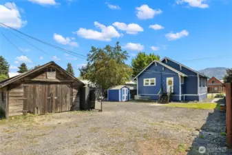 Back yard with gate opened.