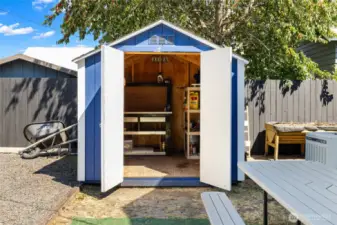 Storage shed with workbench