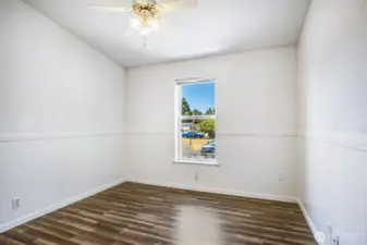 Ceiling fans are located in each room for refreshing cool in warmer months.