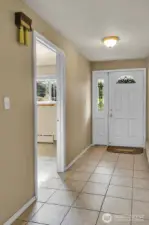 formal entry with tile floor,.