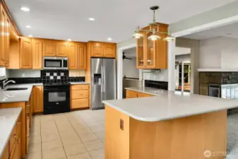 Kitchen eating space around large island.