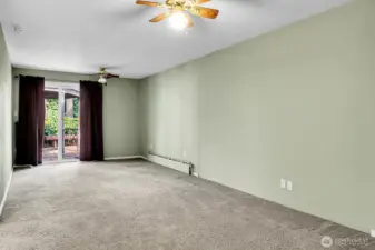 Formal dining room offers sliding glass door access to patio.