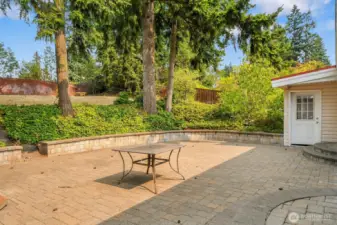 Awesome patio in two tiered yard.