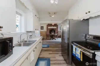 Kitchen looking toward a more formal dining room or could be used as a flex space.