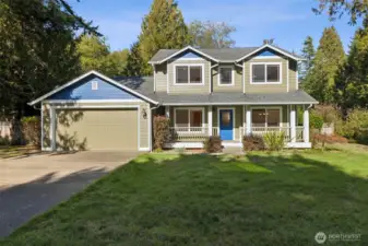 In a beautiful setting, with a long driveway out front for plenty of parking.