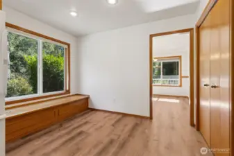 Cozy breakfast nook with storage bench. Your pantry on the right.