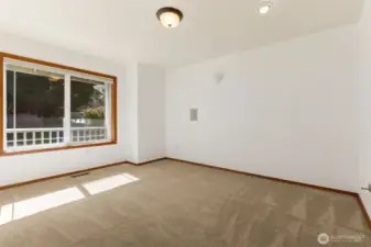 Front bedroom on the main floor overlooking the front yard.