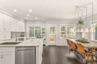 Updated kitchen, with island/bar seating and large dining area is great for entertaining guests