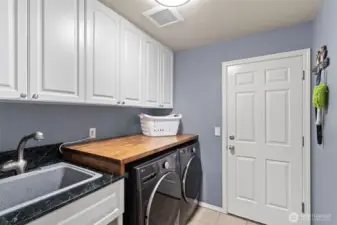 Utility room with storage and counter space