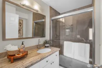Beautiful & contemporary Primary bathroom with quartz counters.