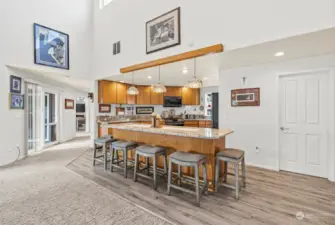 Expansive vaulted ceilings, abundant natural light, and an open concept kitchen/great room creates a grand yet inviting space.