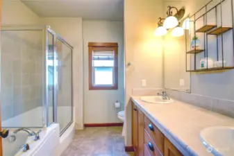 Double sink, separate shower and tub.