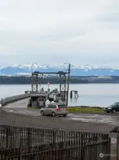 Ferry dock from mainland. Olympic mountains in background.