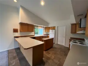 Open kitchen area with eating area.