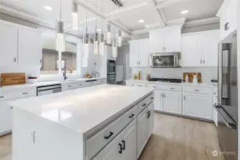 Kitchen with fresh paint and new quartz counter tops.