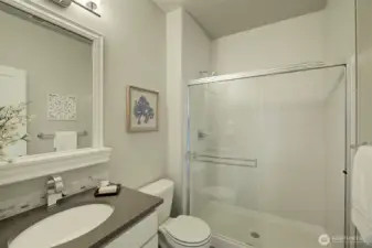 Main floor bath. Attractive tile shower.