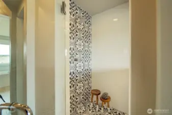 Primary bath tiled shower.